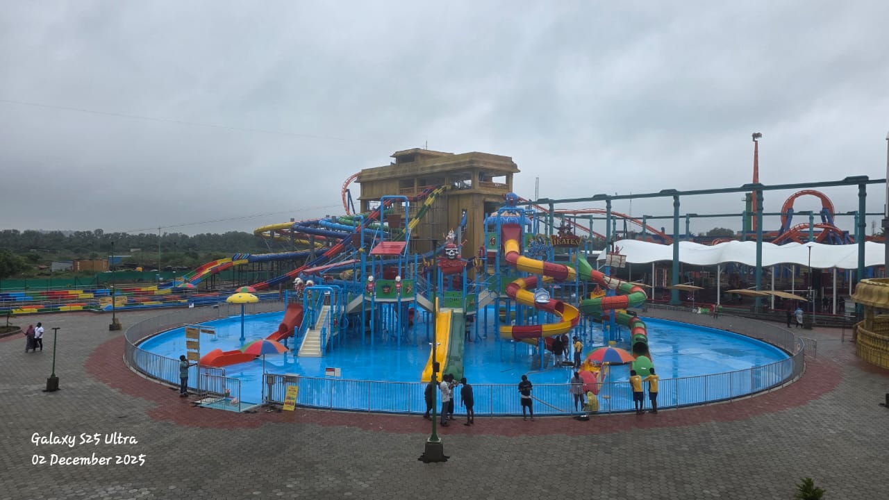 Pool contractor — Large water park development with multi-slide tower by Dreamz Pools