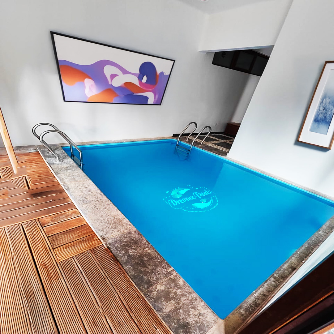 Pool contractor — Indoor pool with wooden deck and modern interior