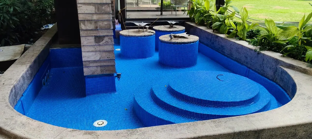 Pool contractor — Rajhans Infratech mosaic-tiled waterbody